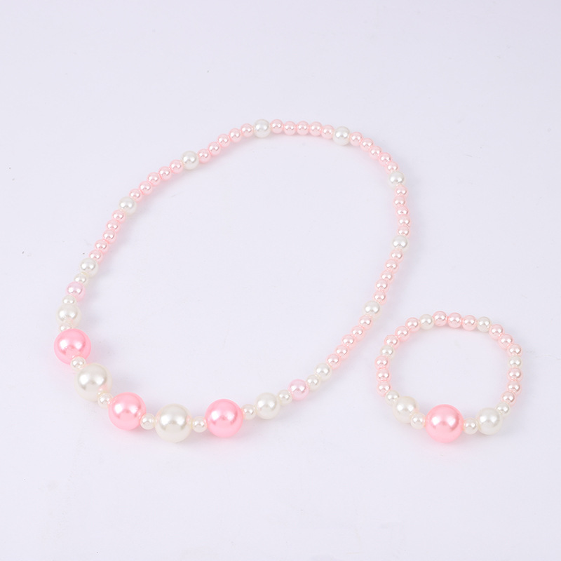 Korean style girls' artificial pearl necklace children's all-match jewelry girls' sweater chain Pearl Chain + bracelet suit wholesale