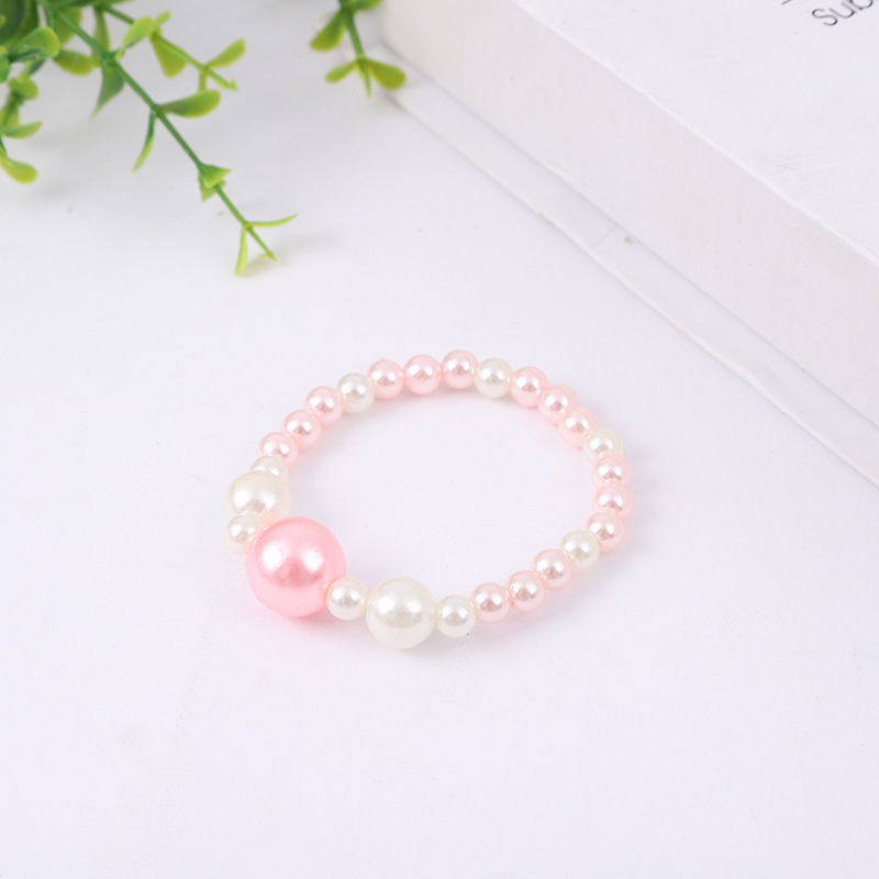 Korean style girls' artificial pearl necklace children's all-match jewelry girls' sweater chain Pearl Chain + bracelet suit wholesale