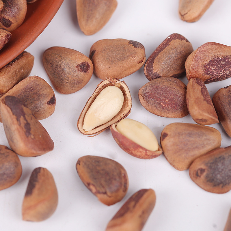 Northeast open pine nuts 500g bag factory wholesale red pine nuts original flavor hand-peeled Changbai mountain pine nuts one-piece delivery