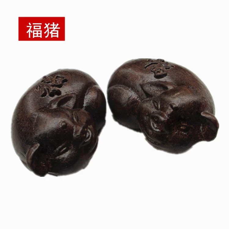 Factory spot Vietnam India agarwood hand piece string Wen play wood carving walnut fu pig decoration style many batches