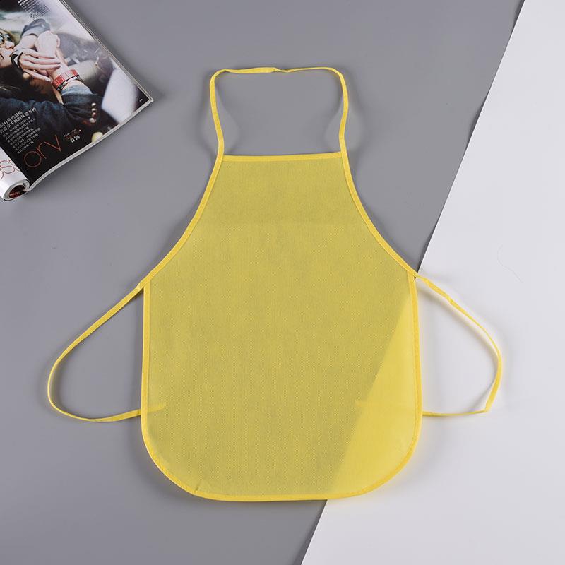 Solid color spot wholesale sewing multi-color children's non-woven apron children's disposable overalls bib painting anti-fouling