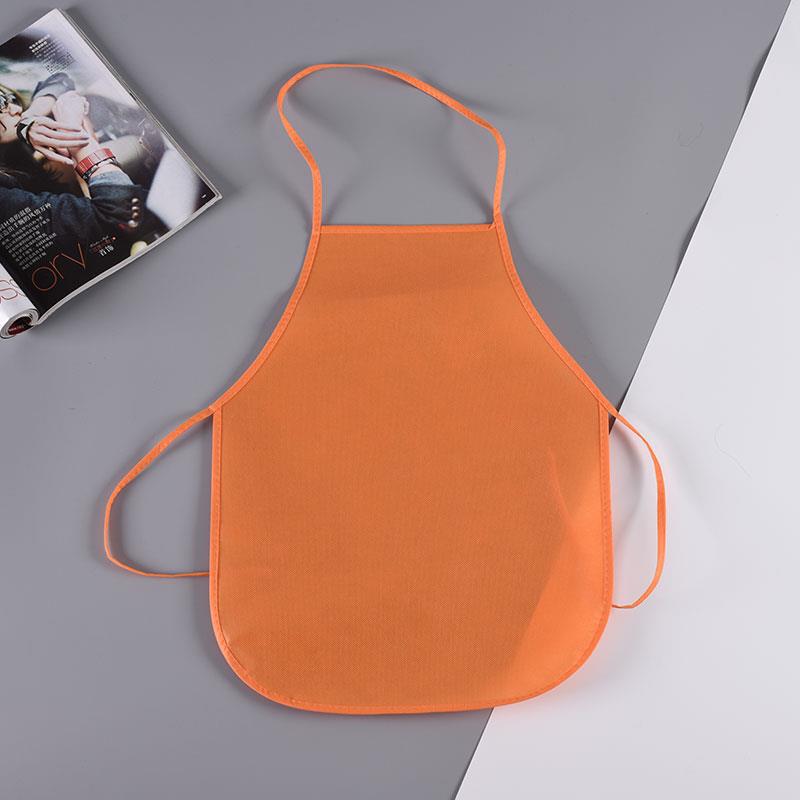 Solid color spot wholesale sewing multi-color children's non-woven apron children's disposable overalls bib painting anti-fouling