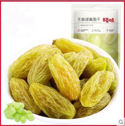 Herbal flavor seedless green raisin 100g Turpan seedless green raisin dried casual snack Fruit Wholesale