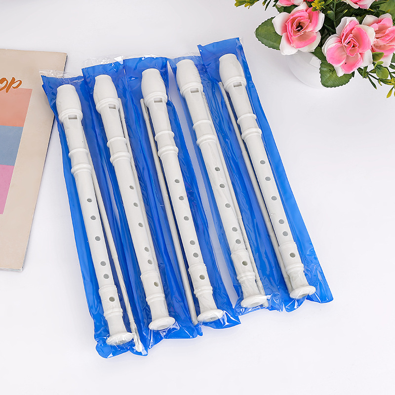 Factory spot wholesale PVC white six-hole flute 6-hole clarinet children's toy flute two-dollar store supply