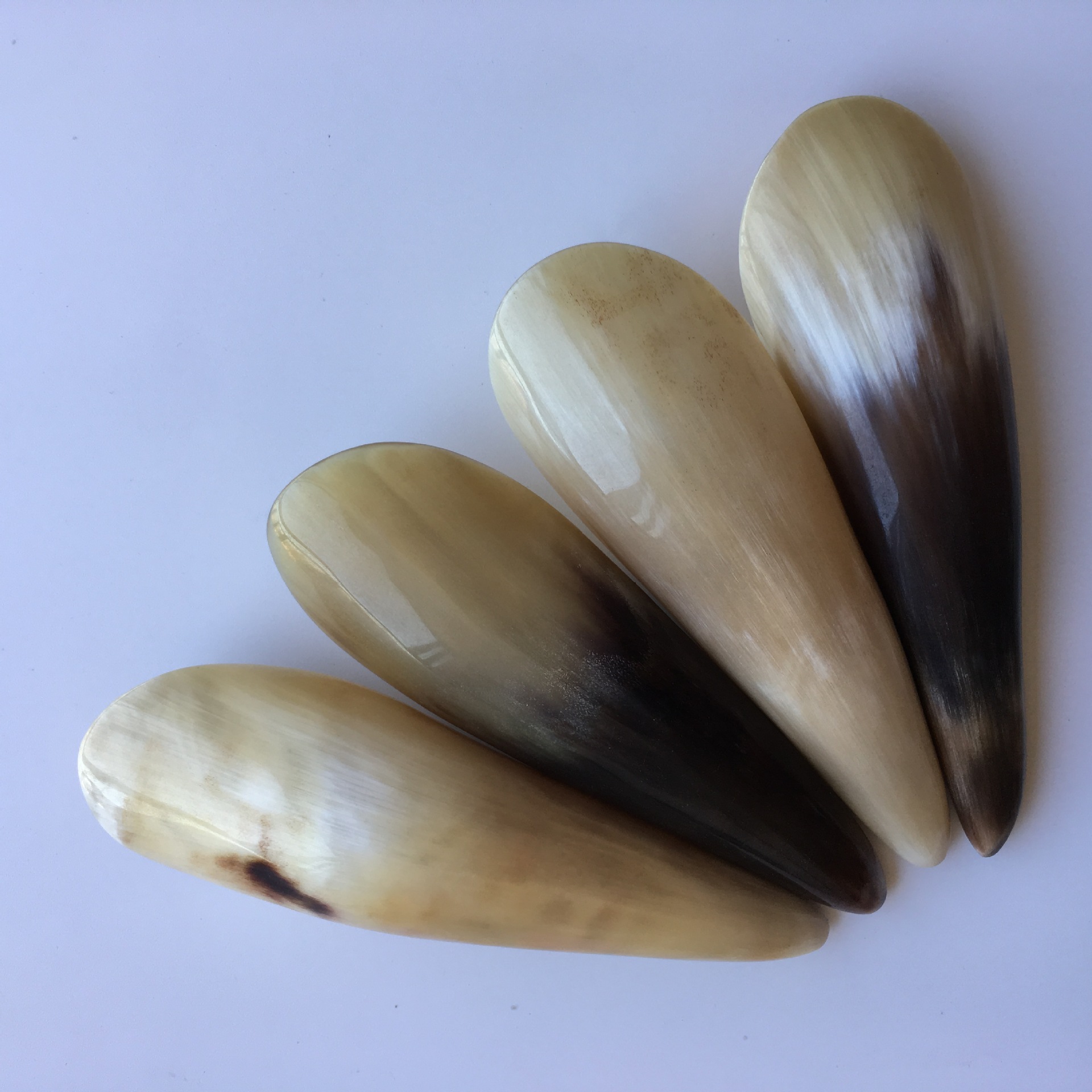 Fuzhou source horn scraping barrel 13 to 16cm tea peony horn comb scraping board factory wholesale