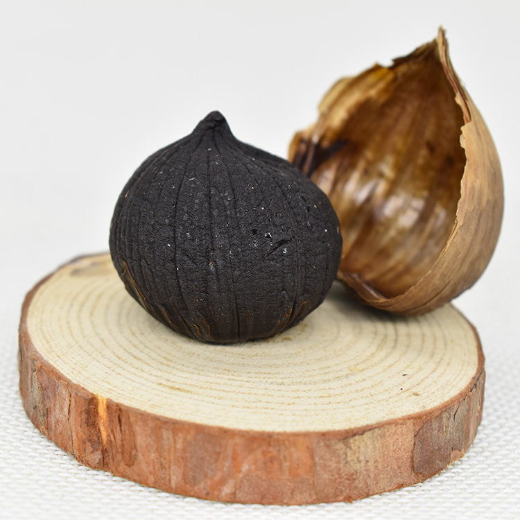 Garlic is not easy to single head black garlic 250g canned Shandong specialty snacks fermented black garlic black garlic in stock wholesale