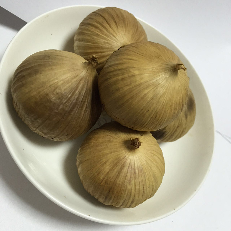 Jinxiang Manufacturers Have Been Supplying Single-Head Black Garlic on a Long-Term Basis. High Quality and Low Price. Large Supply of 250g Single-Head Black Garlic Canned Products