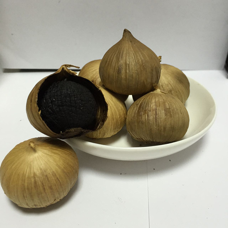Jinxiang Manufacturers Have Been Supplying Single-Head Black Garlic on a Long-Term Basis. High Quality and Low Price. Large Supply of 250g Single-Head Black Garlic Canned Products