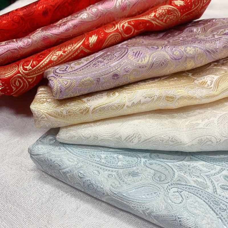 Manufacturers supply imitation Sanwu brocade pipa Flower jacquard fabric children's cheongsam New Year greeting clothes handmade and other fabrics
