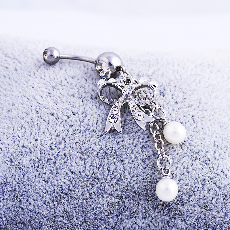 Amazon AliExpress hot-selling diamond-embedded navel ring bow pink navel jewelry body piercing jewelry navel ring