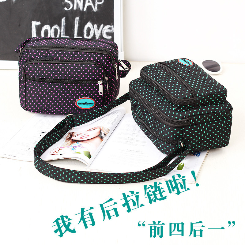 Korean style casual dot canvas women's bag factory wholesale middle-aged and elderly crossbody large capacity multi-layer shoulder bag running rivers and lakes