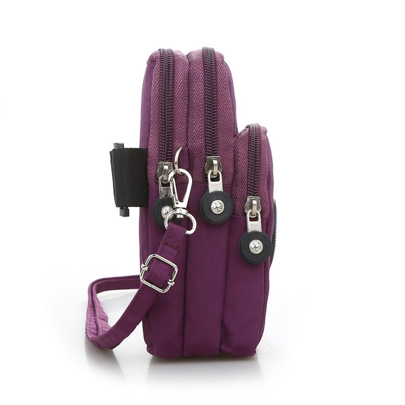 The new canvas solid color wash single shoulder arm bag travel Japanese fashion casual waterproof Korean student phone bag