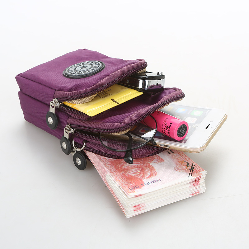 The new canvas solid color wash single shoulder arm bag travel Japanese fashion casual waterproof Korean student phone bag