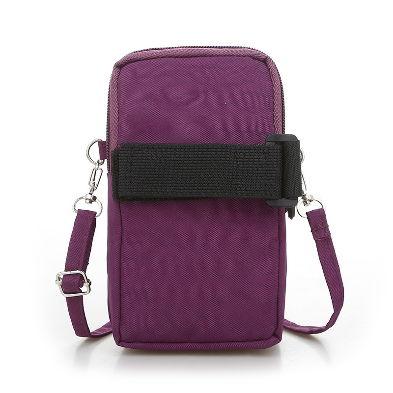 The new canvas solid color wash single shoulder arm bag travel Japanese fashion casual waterproof Korean student phone bag