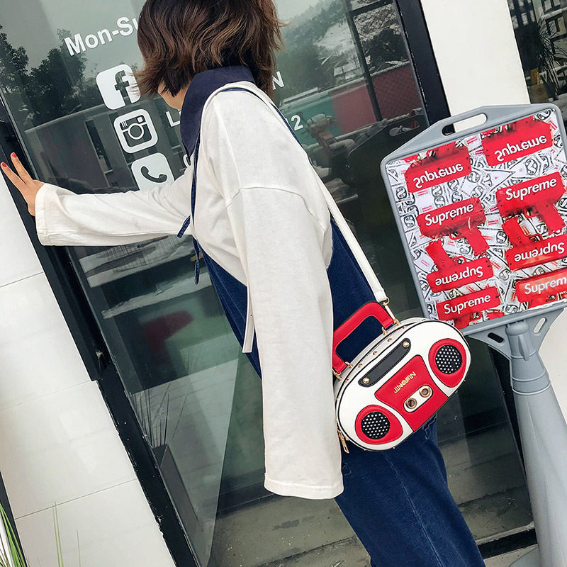 Factory wholesale European and American fashion simulation radio stereo shoulder bag funny personality diagonal rivet messenger bag women