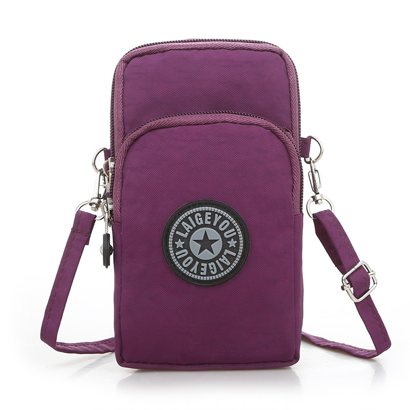 The new canvas solid color wash single shoulder arm bag travel Japanese fashion casual waterproof Korean student phone bag