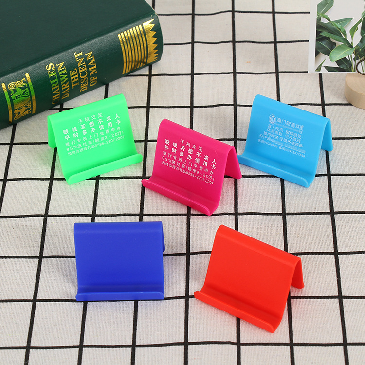 Wholesale gift advertising mobile phone holder text plastic lazy mobile phone holder simple and convenient mobile phone holder in stock