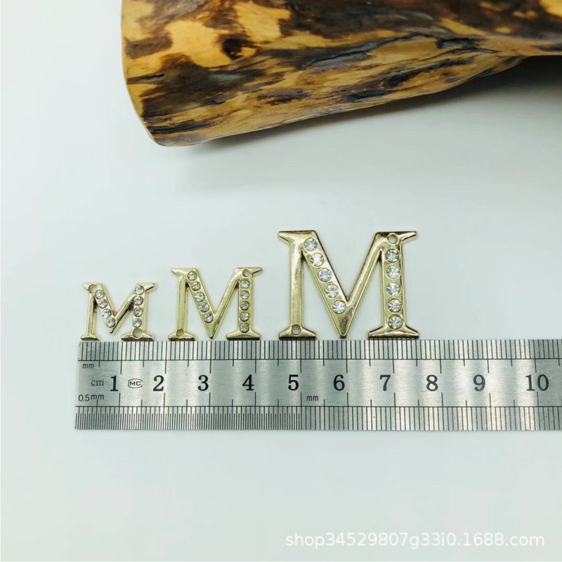 Factory wholesale DIY jewelry accessories alloy diamond M letter hand-sewn paste clothing shoes and hats hardware label