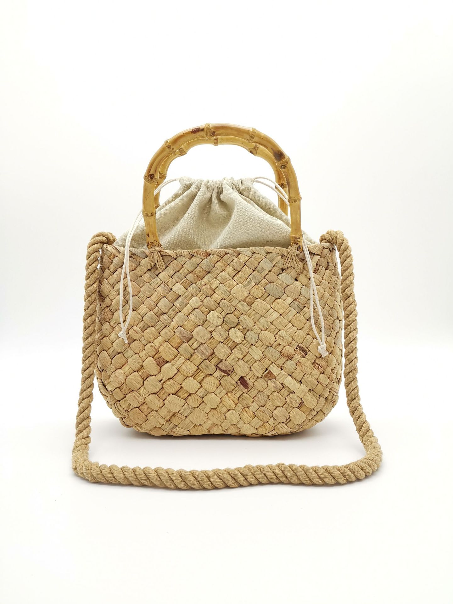 Artistic beach straw woven hollow handbag new cotton rope hand woven bag straw handbag