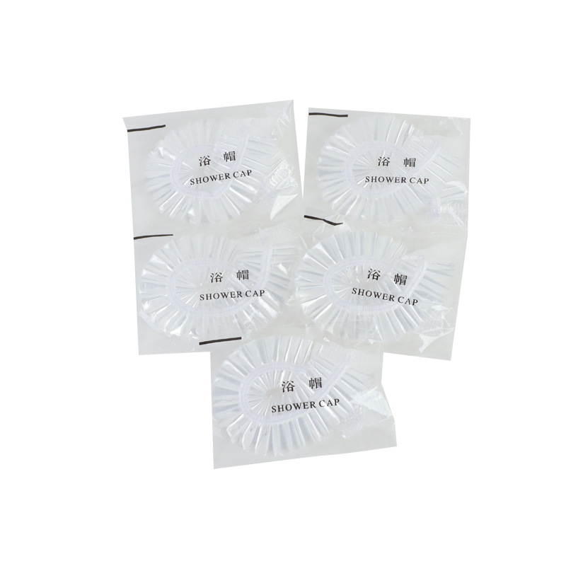 Factory wholesale disposable shower cap pe plastic transparent thick strip waterproof shower cap hotel supplies 100 Pack
