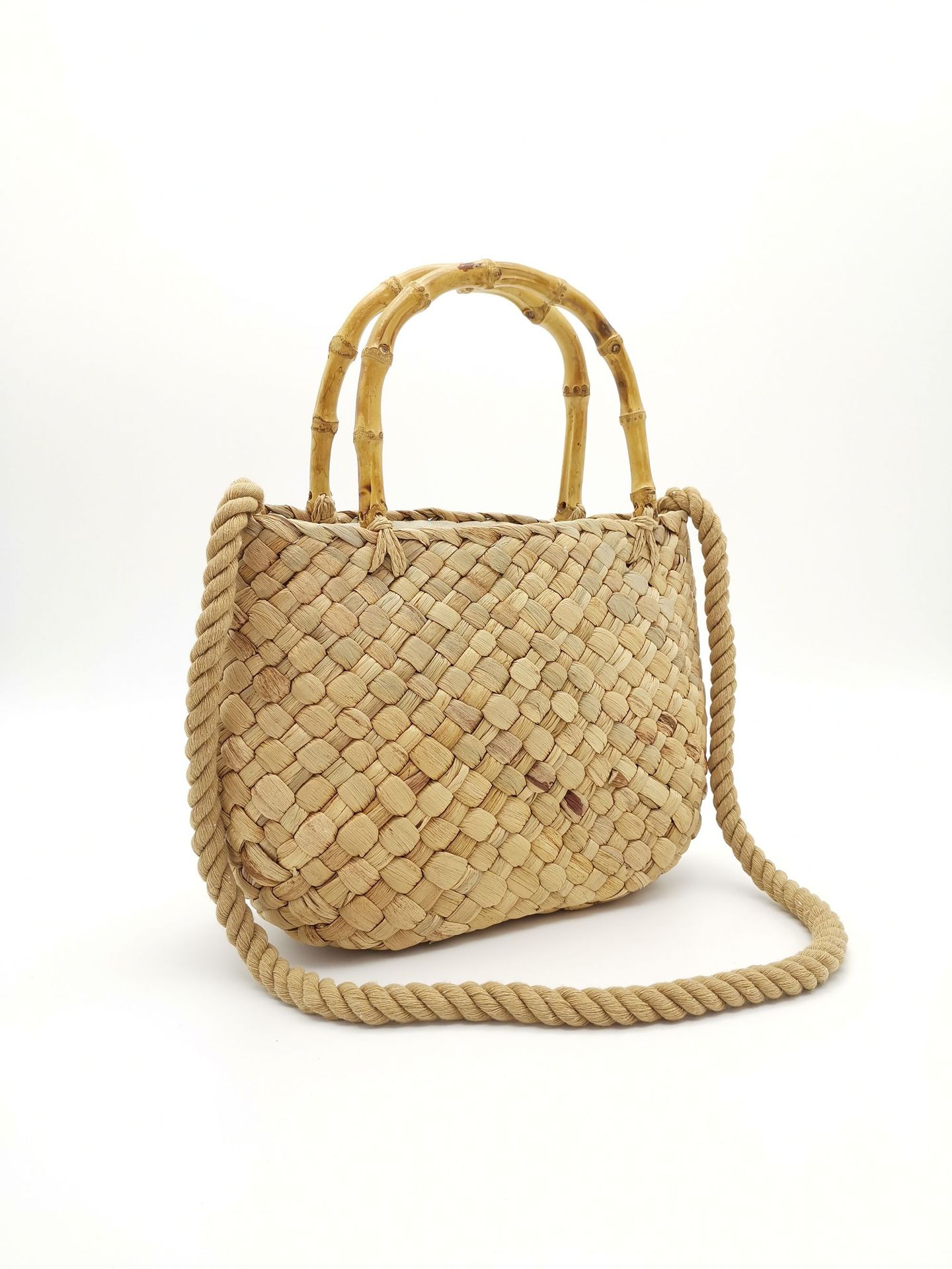Artistic beach straw woven hollow handbag new cotton rope hand woven bag straw handbag