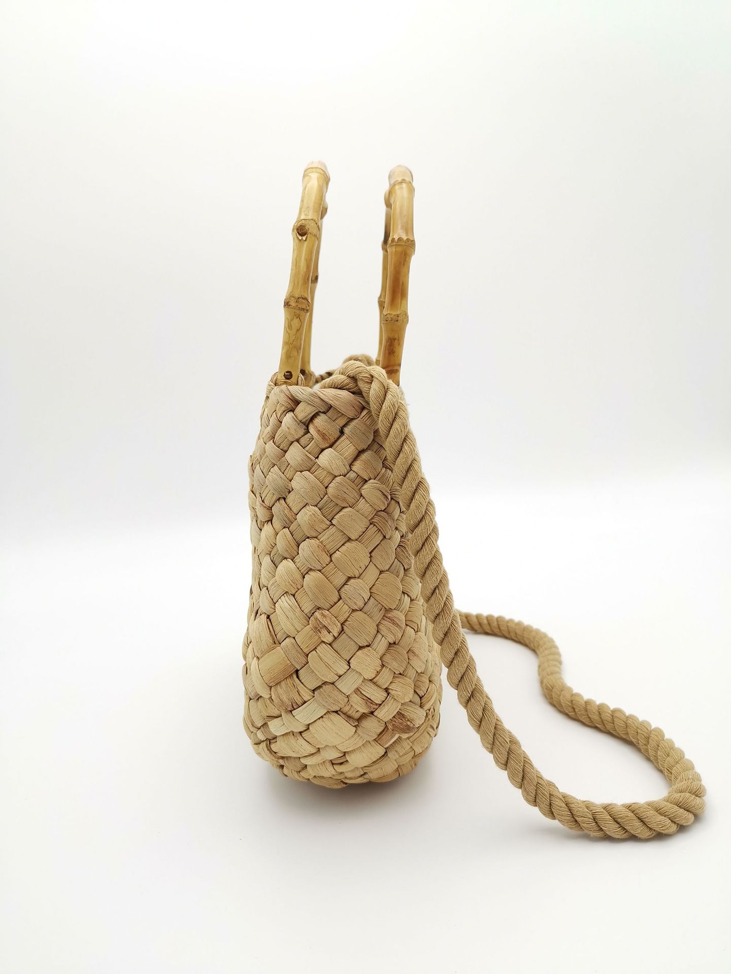 Artistic beach straw woven hollow handbag new cotton rope hand woven bag straw handbag
