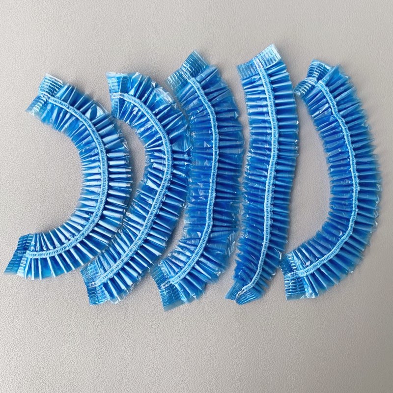 Spot wholesale disposable PE plastic shower cap shower strip thickened waterproof shower cap hair hair hair treatment cap