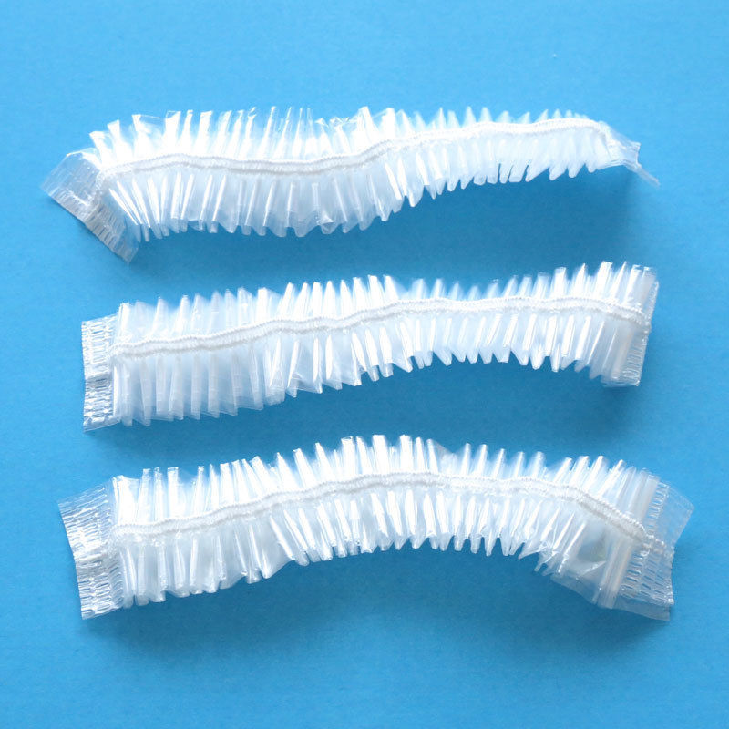 Disposable shower cap strip plastic waterproof enlarged thick hairdressing Hotel Hotel pe independent packaging shower cap high pressure