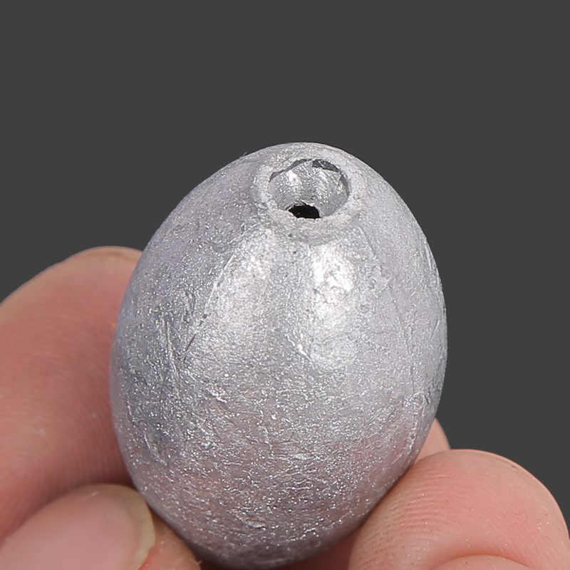 Factory wholesale olive lead pendant heart fishing pendant does not hurt the line scale hollow lead pendant freshwater sea fishing dimple bite lead