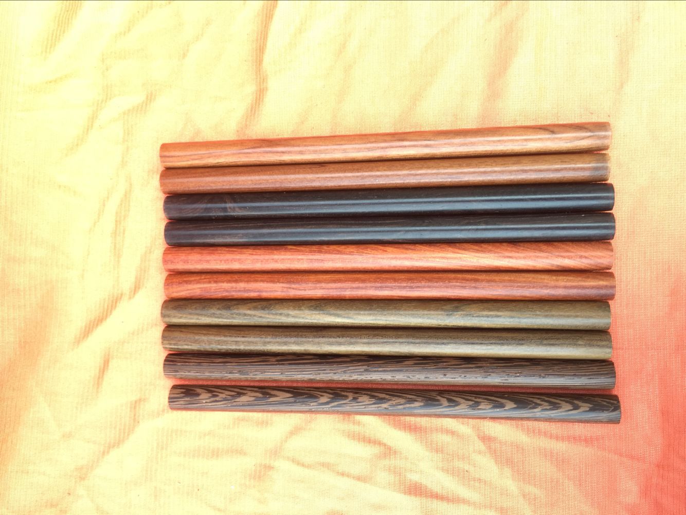 Factory wholesale 180*11 cigarette holder material Red sandalwood red noble treasure purple sandalwood chicken wing Wood deep Noble hole Rosewood round stick