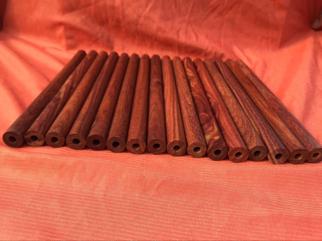 Factory wholesale 180*11 cigarette holder material Red sandalwood red noble treasure purple sandalwood chicken wing Wood deep Noble hole Rosewood round stick