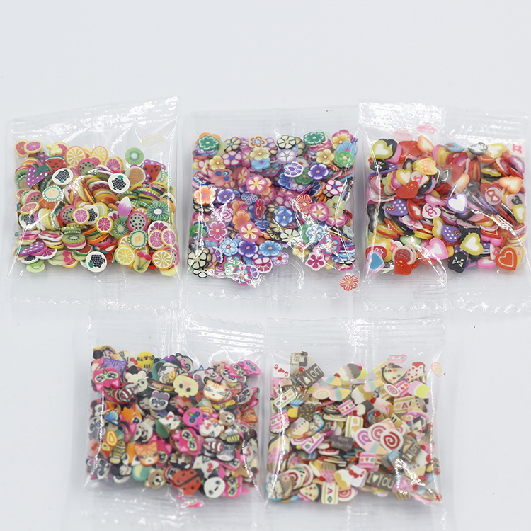 Foreign trade hot nail jewelry soft pottery fruit cartoon mixed soft pottery 3 grams beauty patch 250PCs