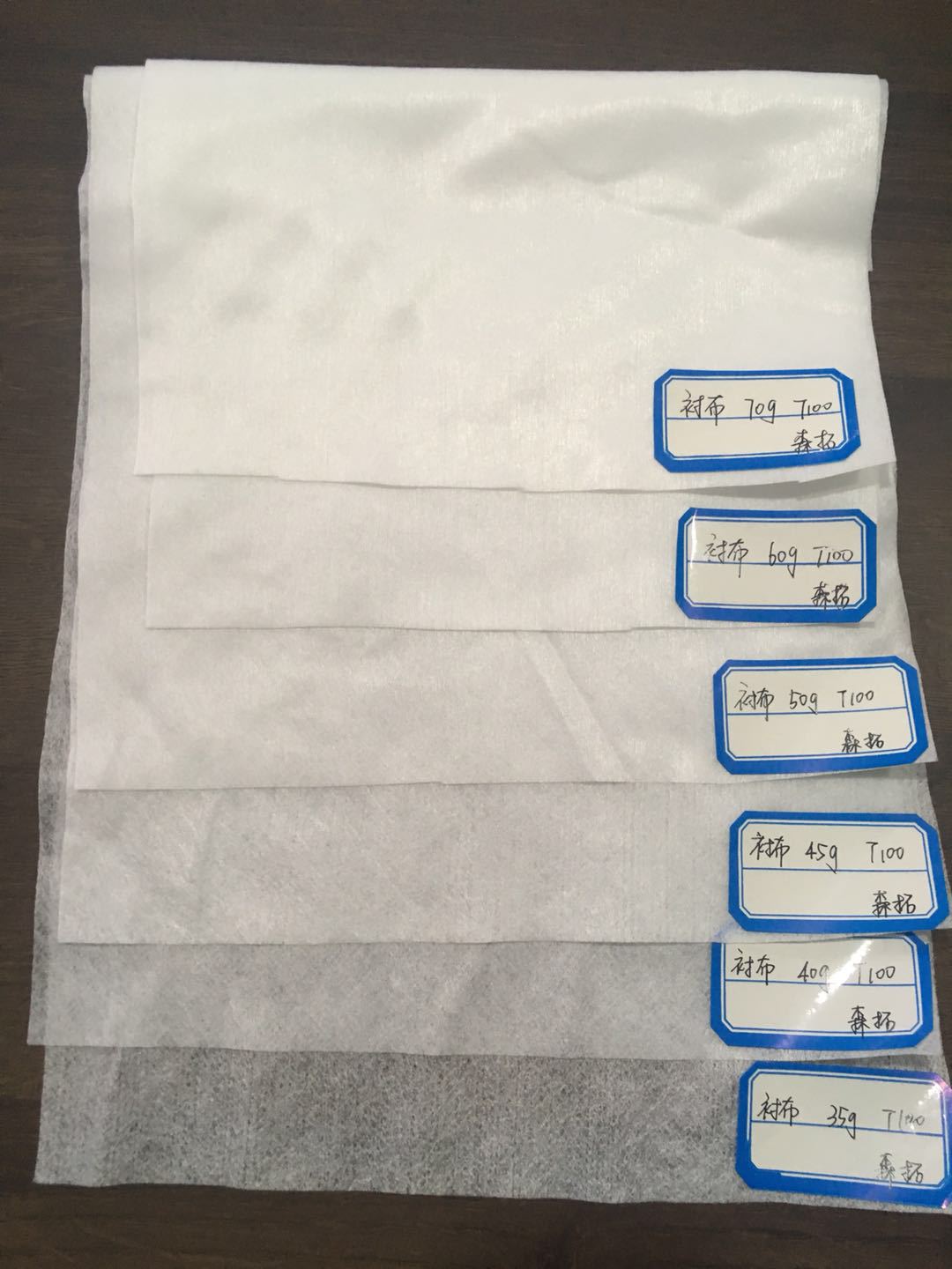 35G white polyester plain weave PET laminated composite panel garment lining spunlace non-woven fabric
