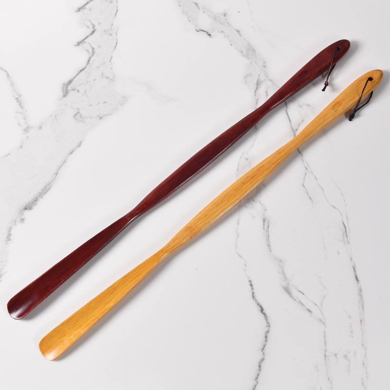 Factory wooden shoe puller solid wood shoe lifter lazy wearing shoes long handle pregnant women elderly lengthened shoe pump wholesale