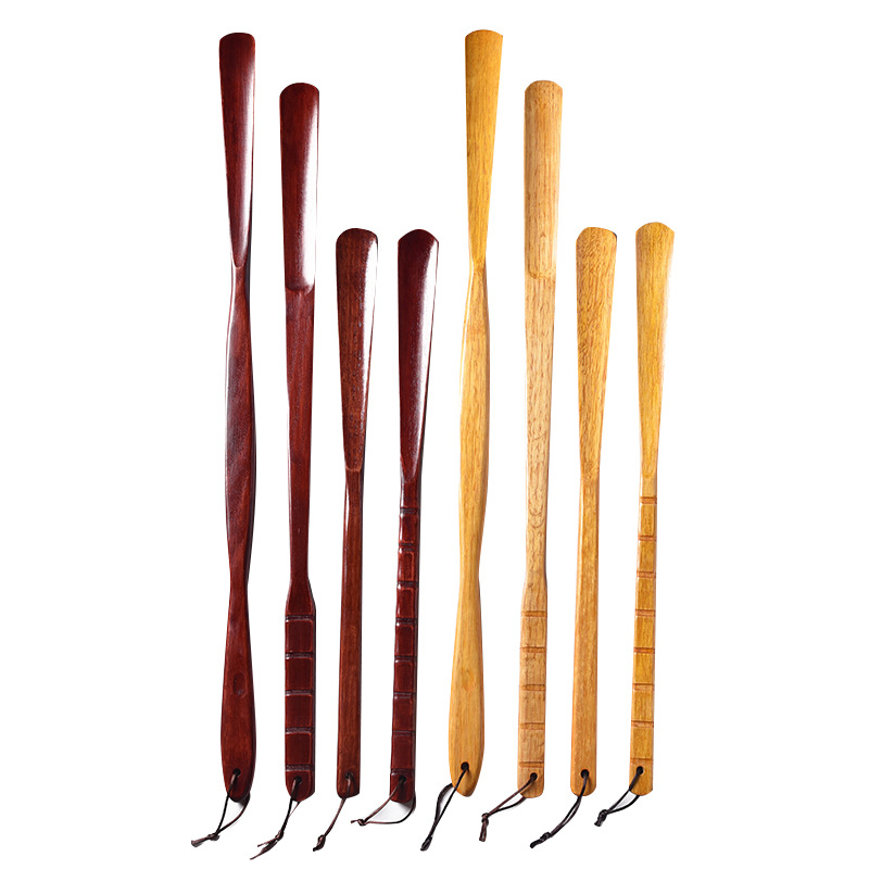 Factory wooden shoe puller solid wood shoe lifter lazy wearing shoes long handle pregnant women elderly lengthened shoe pump wholesale