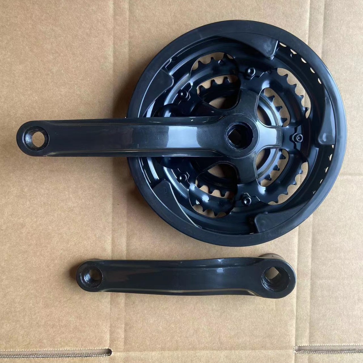 Mountain bike dental plate dental plate coated with plastic iron crank three-piece plate 21 speed 24 speed 42T dental plate shield 48 dental plate