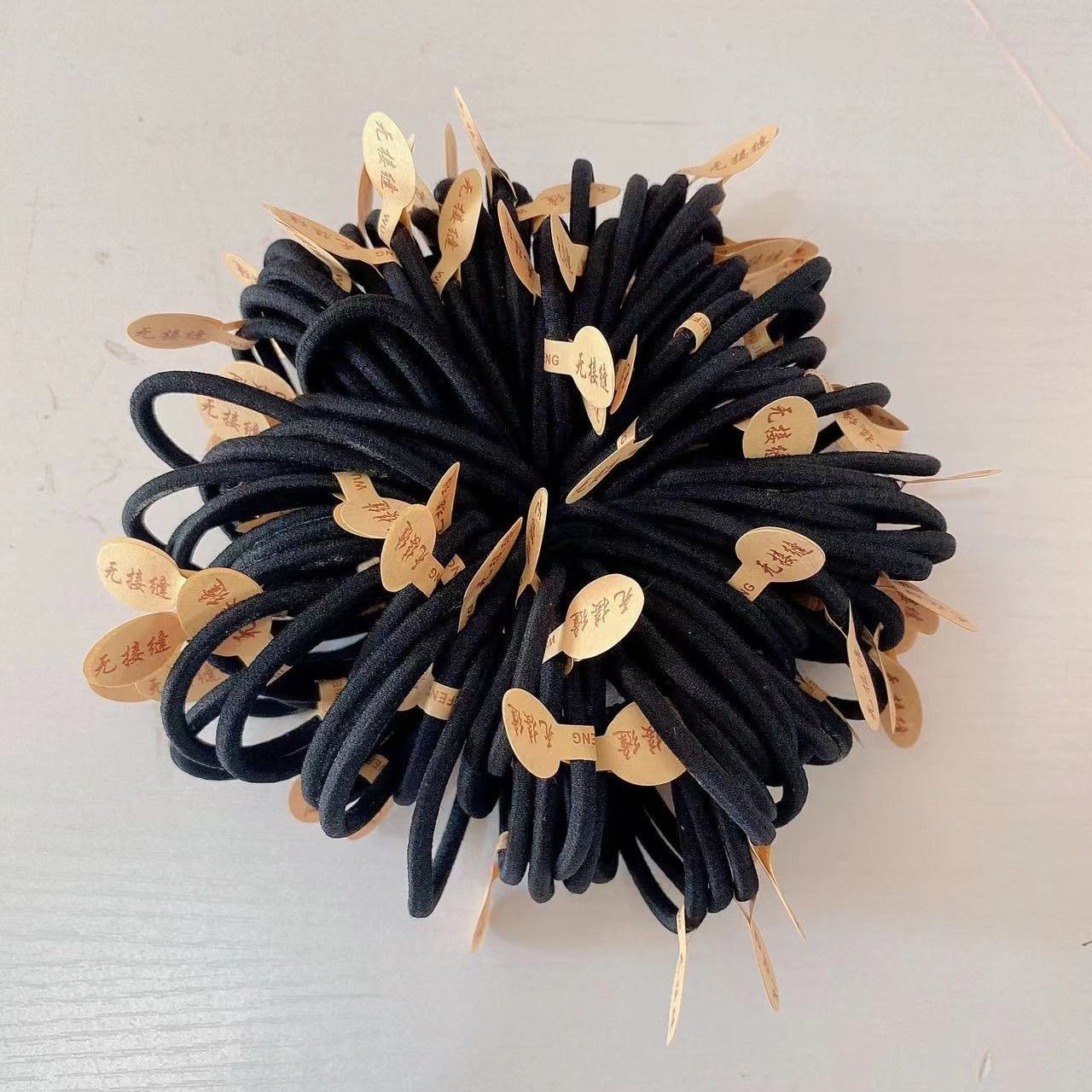 Корейская версия высокоэластичной практичной бесшовной резинки для волос, базовая нейлоновая веревка, оптовая продажа 2 юаня