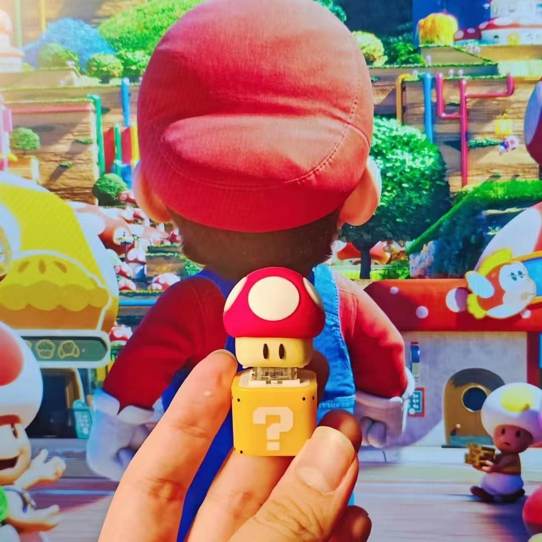 Cross-border hot new Mario wooden fish +1 crayon Xiaoxin butt key cap funny sound effect sounder key chain