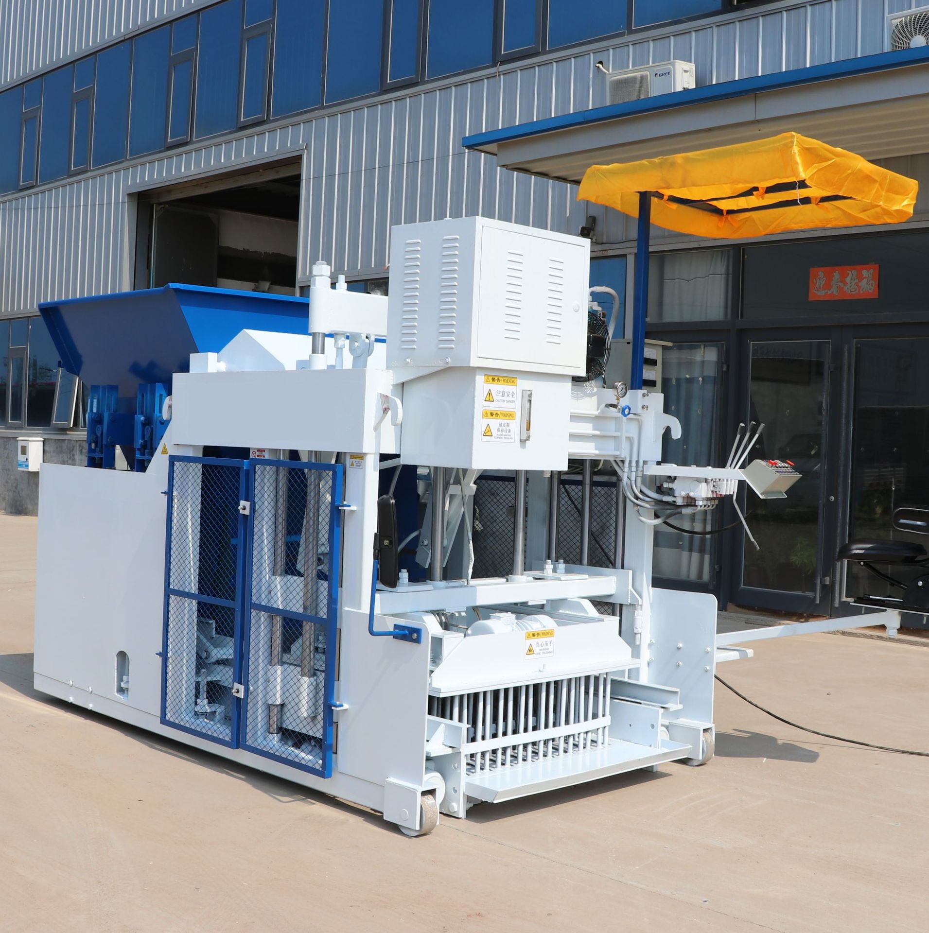 Production JH12A brick making machine hydraulic burn-free mobile brick machine semi-automatic cement hollow block brick machine