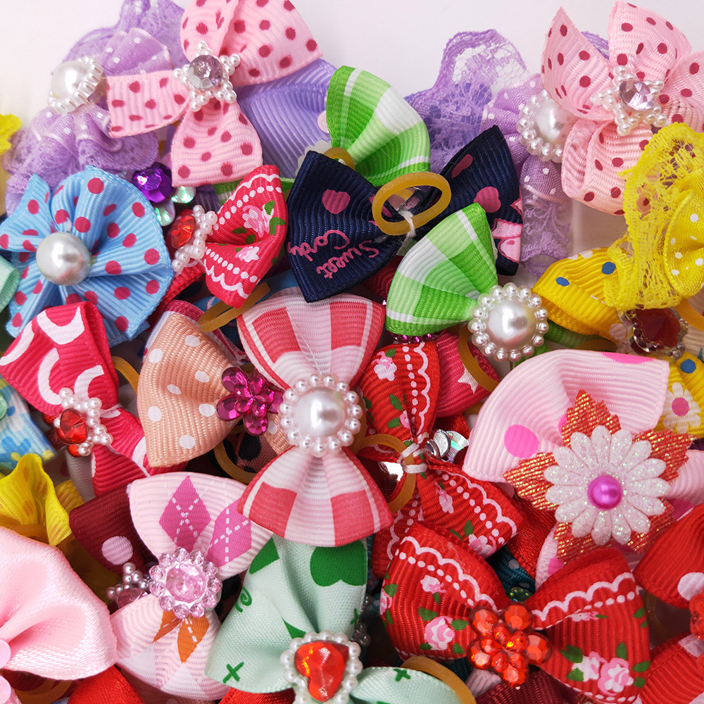 New pet holiday headdress small bow with diamond teddy bear headdress small rubber band Dog Head Flower Factory Outlet