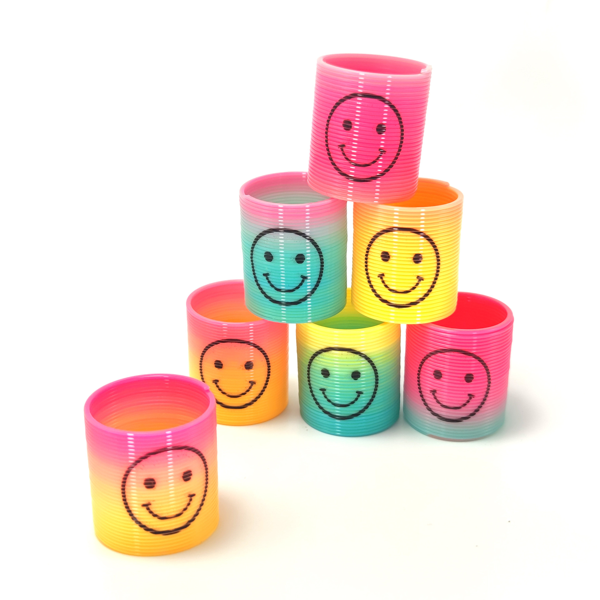 Cross-border educational children's small size smiley face gradient Taiwan color spring ring plastic rainbow ring gift small toy wholesale