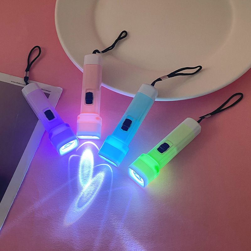 New macaron color small flashlight strong light flashlight LED wholesale stall practical small household appliances gift
