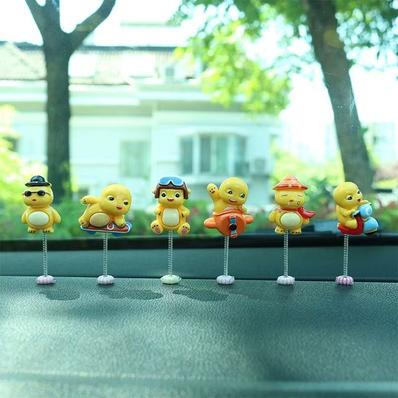 Creative new cloud shake head milk dragon car ornaments resin decoration cute little dragon car center console interior accessories