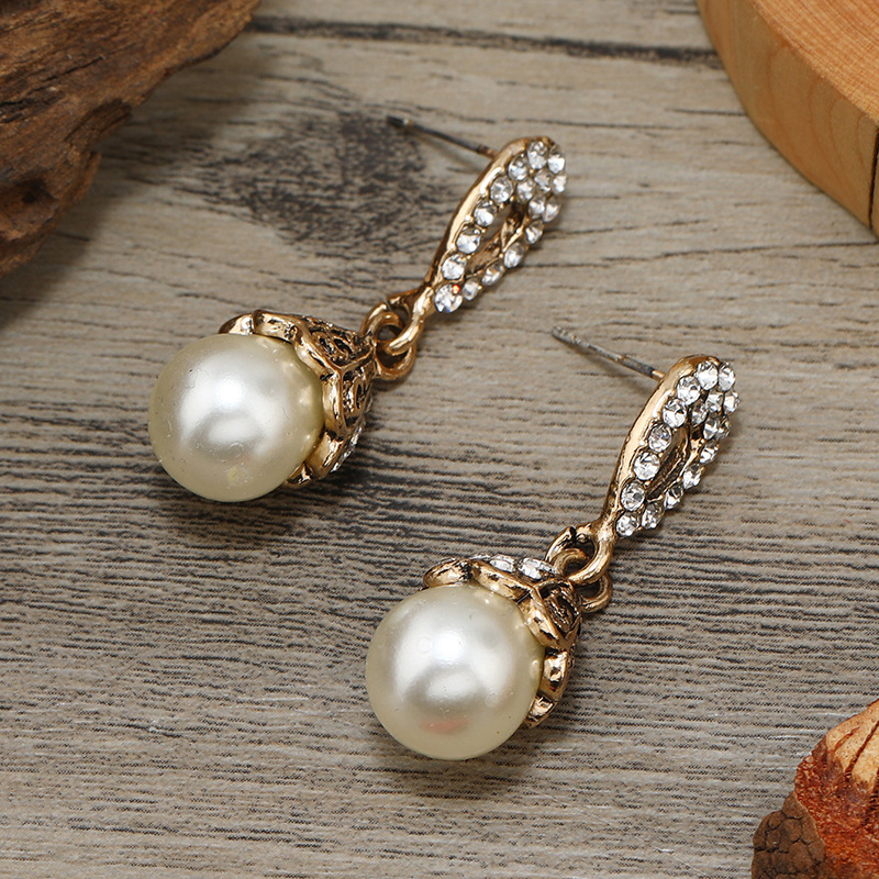 French retro creative personality water drop pearl pendant earrings Korean temperament trendy niche creative design earrings