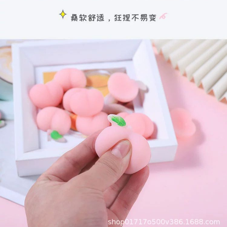 Pinching music peach ball butt peach decompression vent TPR cute butt phone case accessories small new Butt