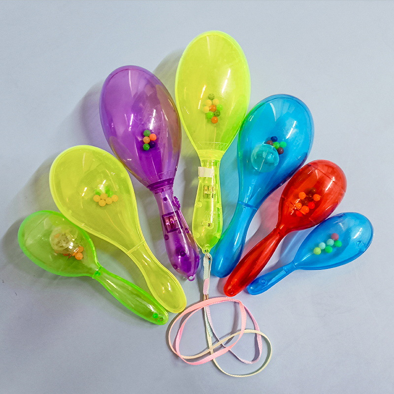 Factory wholesale a variety of transparent flash plastic sand hammer solid color plastic sand ball baby rattle toys can be printed logo