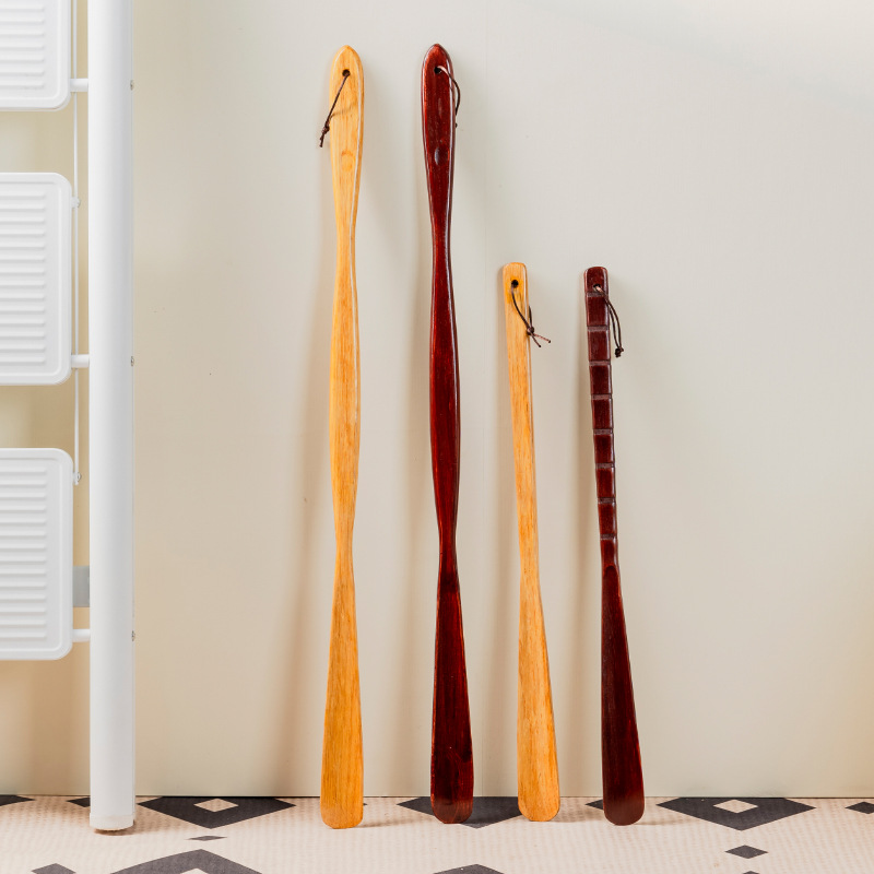 Solid wood long handle shoehorn household lengthening elderly pregnant women do not bend over to lift shoes light luxury shoepick manufacturers wholesale
