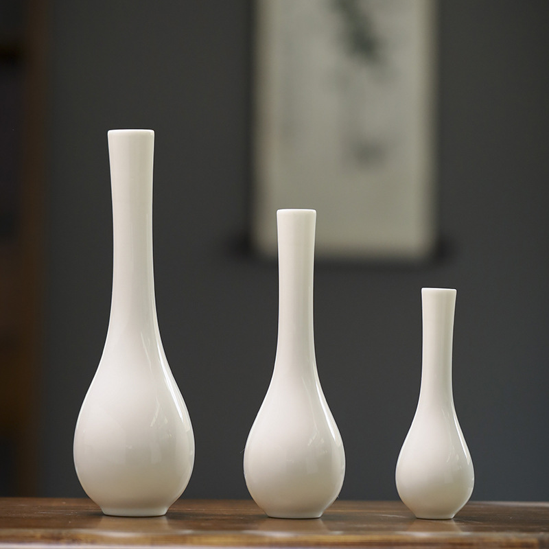 Белая фарфоровая нефритовая бутылка, ваза Гуаньинь, маленькая цветочная композиция, длинношеяя нефритовая фарфоровая керамическая ваза для очистки воды перед Буддой