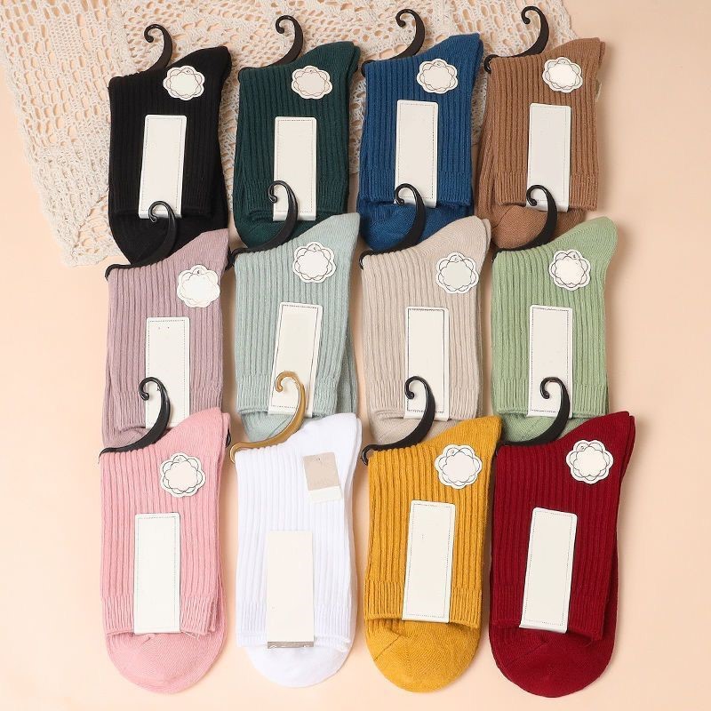 Women's socks spring and summer Four Seasons solid color mid-calf length socks vertical stripes casual women's confinement socks pile socks Japanese style stockings wholesale