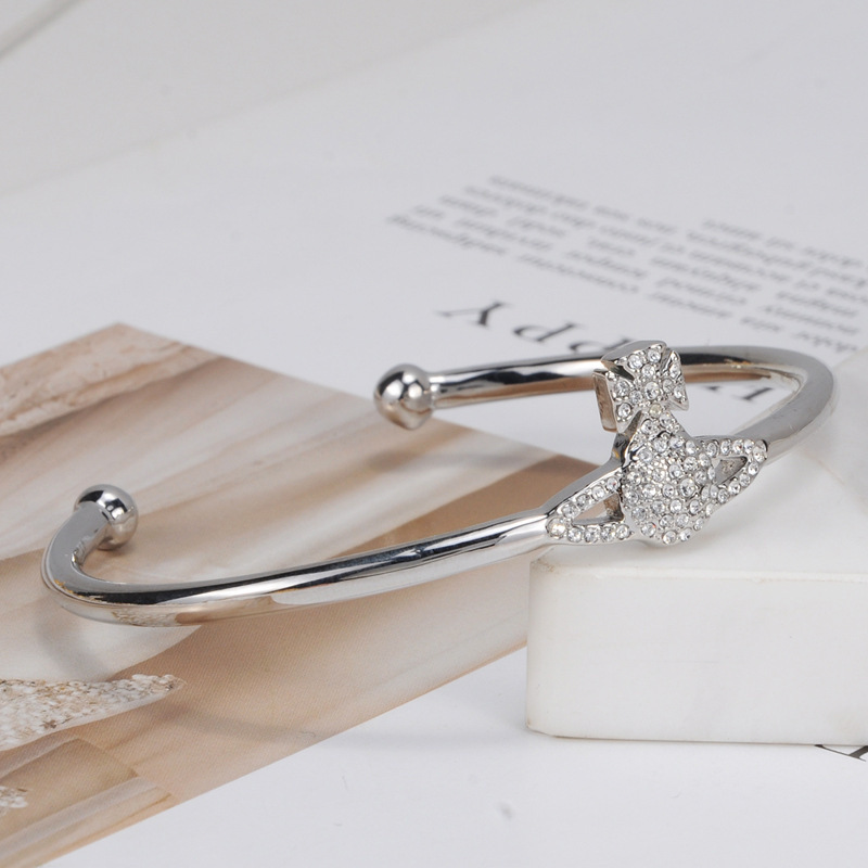 Empress Saturn Series Silver Champagne Diamond Shiny Saturn Logo Bracelet